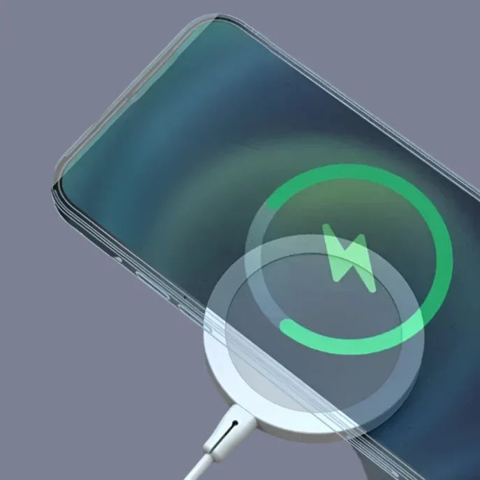 an iphone charging station with a green circle on it