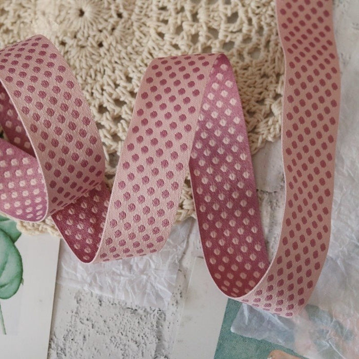 Pink and purple polka dots