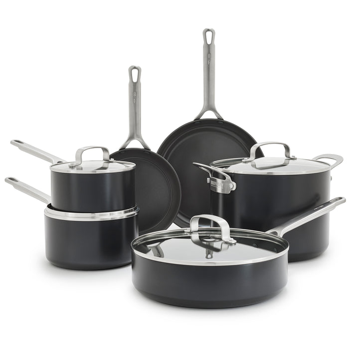 10-piece black hard anodized cookware set with stainless handles and glass lids.