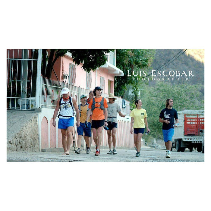 "Born To Run" Book - signed & footprinted by BFT - runners on the road - photo by Luis Escobar