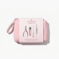 A pink zippered pouch labeled “LONDONTOWN Complete Nail Tool Set” features images of a nail clipper, cuticle nipper, file, and orange stick. This set of precision tools from LONDONTOWN is designed to help you achieve the perfect canvas for your manicure.