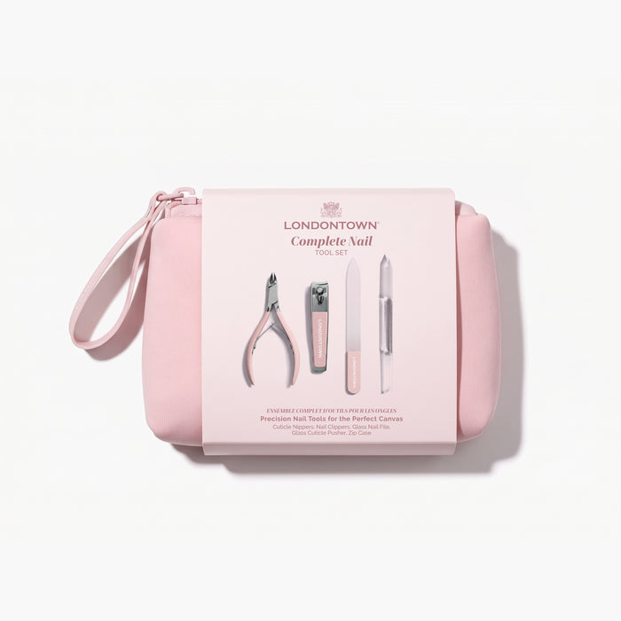 A pink zippered pouch labeled “LONDONTOWN Complete Nail Tool Set” features images of a nail clipper, cuticle nipper, file, and orange stick. This set of precision tools from LONDONTOWN is designed to help you achieve the perfect canvas for your manicure.