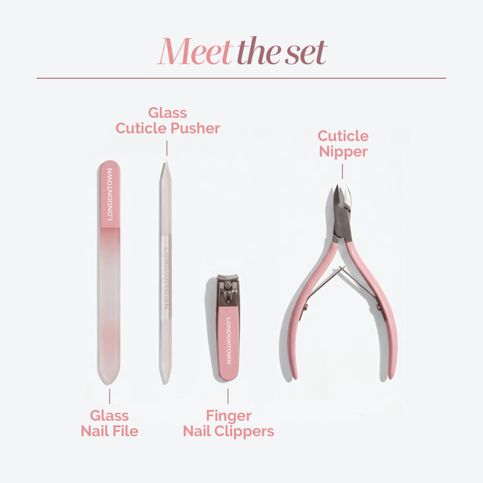 The Complete Nail Tool Set by LONDONTOWN features four expertly labeled tools—a glass nail file, glass cuticle pusher, fingernail clippers, and a cuticle nipper—arranged side by side on a white background to provide the perfect collection for creating your ideal canvas.
