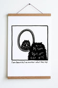 black line drawing in square of back of dogs head looking at reflection in oval mirror with tongue sticking out text underneath reads i am beautiful no matter what they say