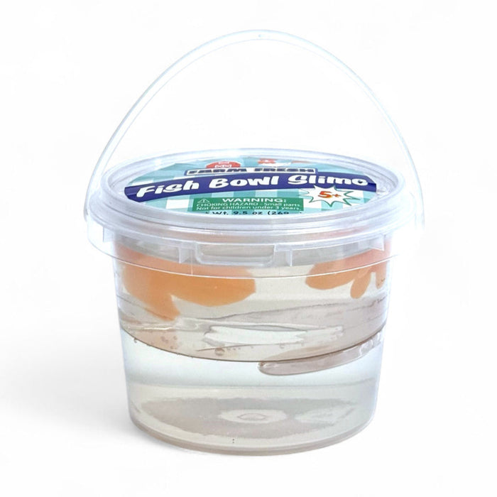 The Farm Fresh Fish Bowl Slime by Farm Fresh is a small clear plastic container with a lid and handle, filled with goldfish slime and toy fish inside—perfect as a fun sensory toy, displayed on a white background.