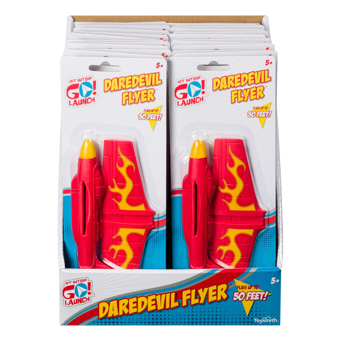 The GO! Launch Daredevil Flyer by GO! Launch features red stunt planes with yellow flames. The display box promotes this launcher toy can soar up to 50 feet, perfect for outdoor play for kids ages 5 and up.
