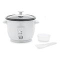 White rice cooker with glass lid, ceramic pot, measuring cup, and rice paddle shown together.