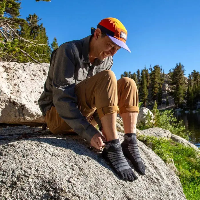 Injinji Toe Socks - Outdoor Midweight Wool - putting on, trailside