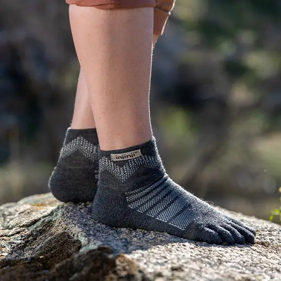 Injinji Toe Socks - Outdoor Midweight Wool - worn, on rock