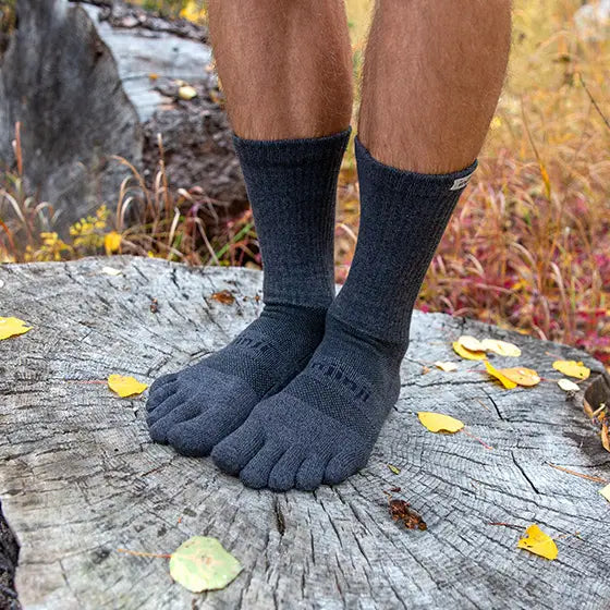 Injinji Toe Socks - Trail Midweight Crew - worn on a stump
