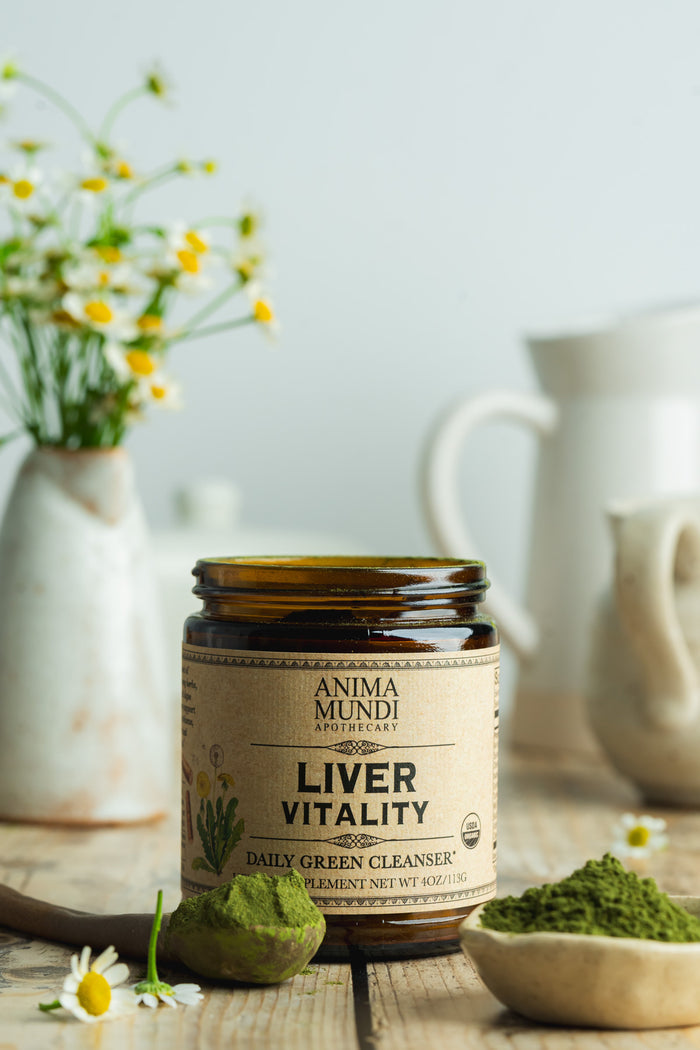 Jar of 'Liver Vitality' supplement with a natural background