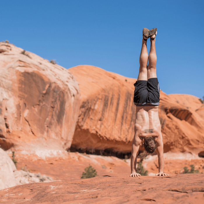 LUNAcycled Mono Winged Edition - Black - handstand in the desert