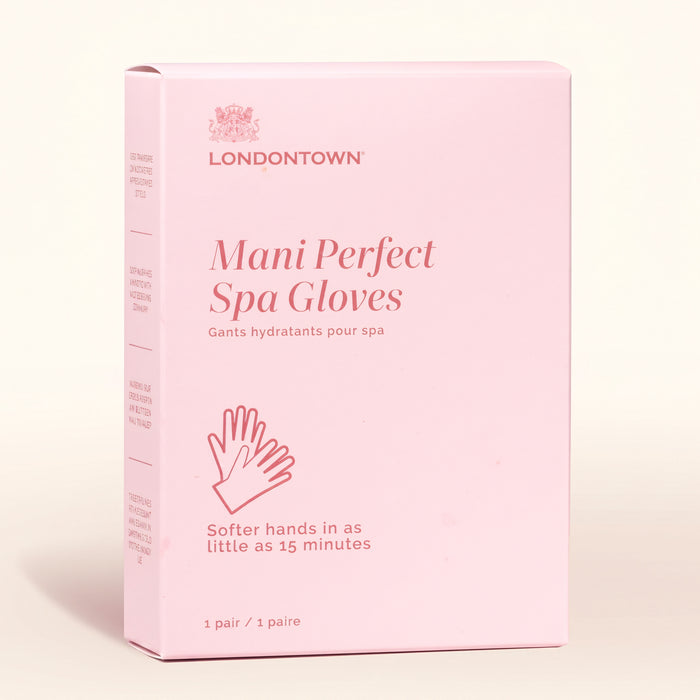 A pink box labeled “LONDONTOWN Mani Perfect Spa Gloves” with hand icons and text promising softer hands in just 15 minutes—a simple hand care solution ideal for your downtime.