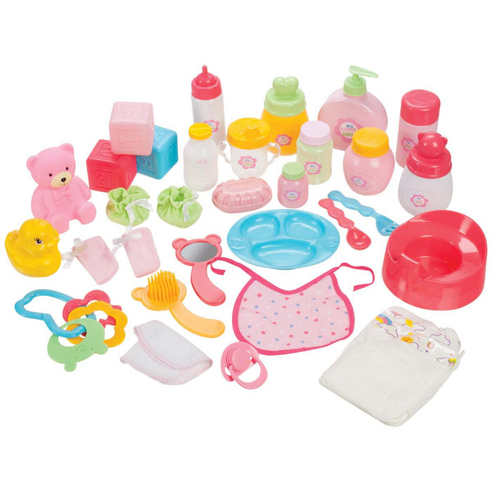 The My Sweet Baby Baby Accessory Kit by My Sweet Baby includes bottles, lotion containers, bib, pacifiers, diaper, toy food, pink teddy bear, blocks, yellow duck, comb, mirror and feeding gear—ideal for nurturing role-play and pretend play.