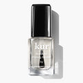 A bottle of "Non-Acid Priming Bonder by LONDONTOWN" featuring a black cap, photographed against a white background—a pro secret for long-lasting manis.