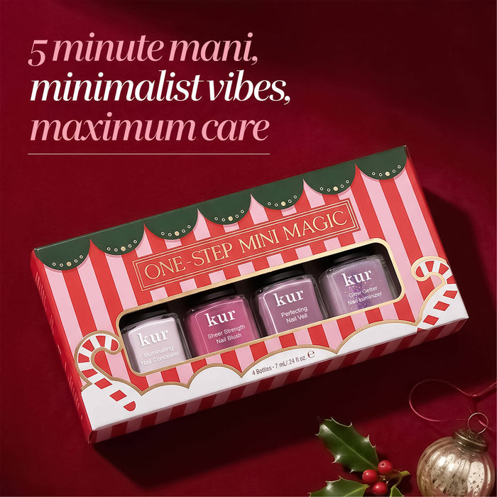 A festive boxed set of four LONDONTOWN One Step Mini Magic nail polish bottles sits on a red background, adorned with a Christmas ornament and holly; text above reads, “5 minute mani, minimalist vibes, maximum care.” This holiday set is perfect for easy One-Step Manicures.