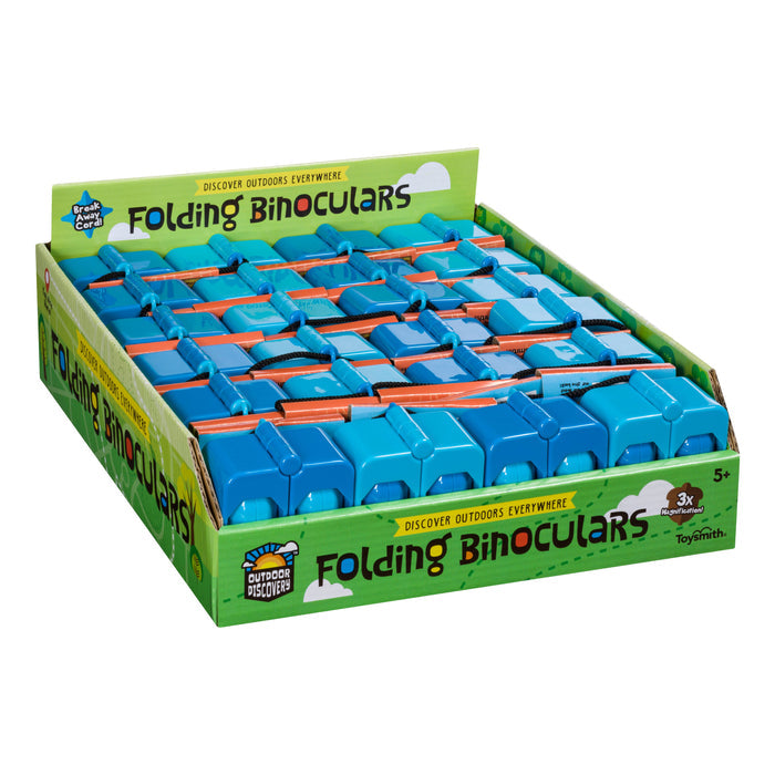 A display box labeled “Outdoor Discovery Folding Binocular” by Outdoor Discovery holds blue and orange binoculars for outdoor exploration, featuring outdoor-themed graphics. Includes “Discover Outdoors Everywhere.” Recommended for ages 5+.