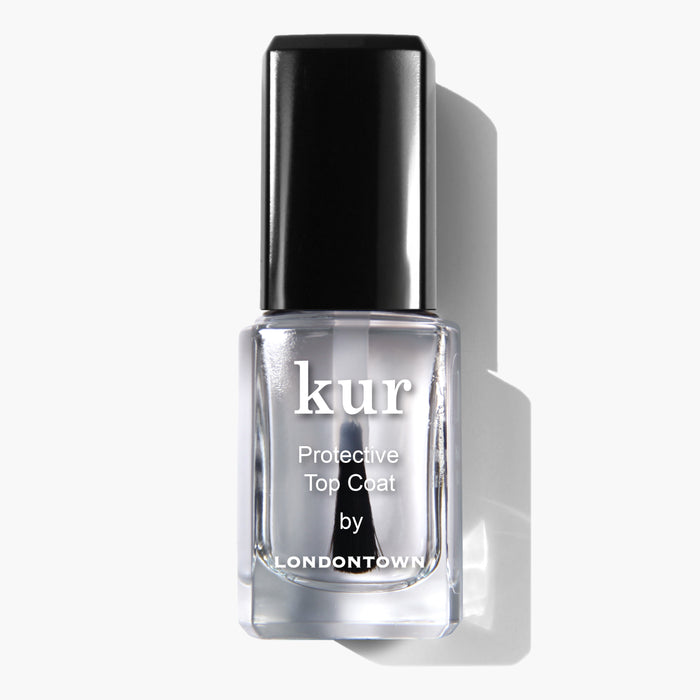 A bottle of LONDONTOWN Protective Top Coat nail polish, celebrated for its chip-resistant, ultra-glossy finish, featuring a black cap and white label against a white background.