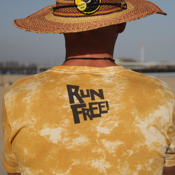 "RUN FREE" LUNA SPLASH TIE-DYE TEE T-SHIRT - back print, worn at the beach