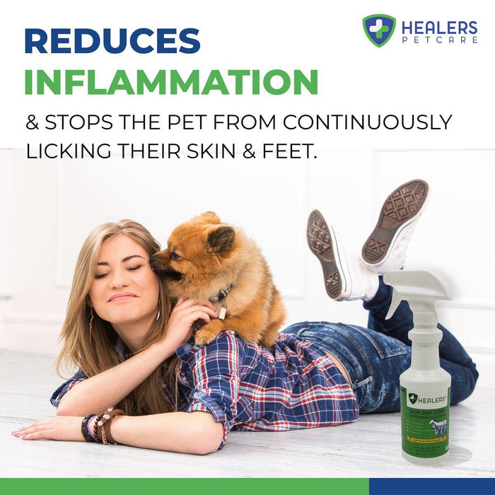 Woman lying on the floor with a small dog licking her face, promoting Healers PetCare spray that reduces inflammation and prevents pets from licking their skin and feet.