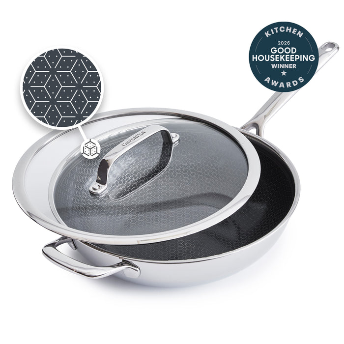 Black 12-inch ceramic nonstick wok with lid, featuring a hexagonal pattern on the cooking surface.