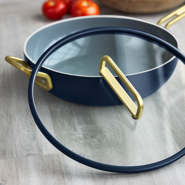 Ceramic nonstick 4.5-quart pan in marino blue with matching glass lid, shown as a set.