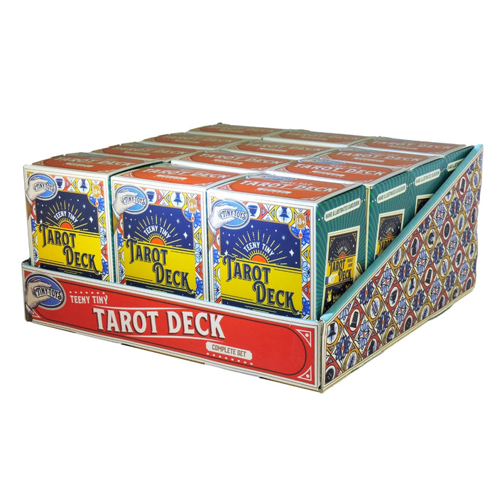 The Tiny Toys Teeny Tiny Tarot Deck comes in a vibrant display box, featuring mini tarot cards with colorful illustrations—perfect for travel or gifting. Each set is by Tiny Toys and offers unique, eye-catching tarot fun on the go.