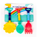 The Toysmith 3PC Sand Tool Set by Toysmith includes a yellow shell-shaped shovel, a green fish tool, and a red octopus rake with multicolored handles, all packaged under a vibrant rainbow-themed design.