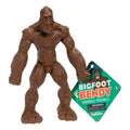 The Toysmith Bigfoot Bendy by Toysmith is a brown, bendable toy figure with fur texture, oversized hands and feet, and an attached tag reading "Bigfoot Bendy.