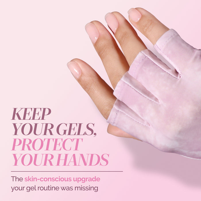 A hand with light pink gel nails wears a fingerless, translucent pink LONDONTOWN UV Glove against a light pink background. The text highlights the benefits of using LONDONTOWN’s UV Gloves for hand protection during your gel nail routine, helping to keep your hands safe and comfortable.